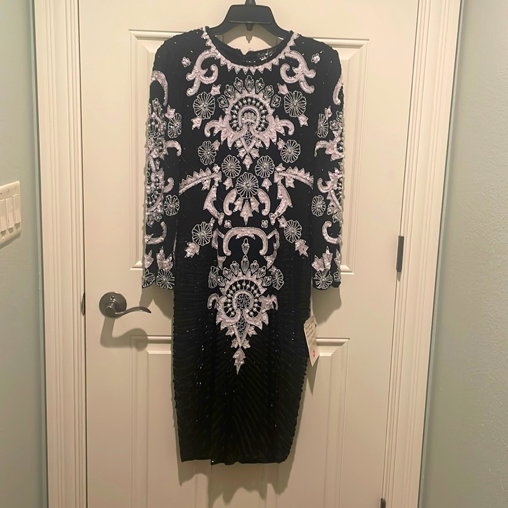 Black Sequin Cocktail Dress. Long Sleeved. Midi Length.